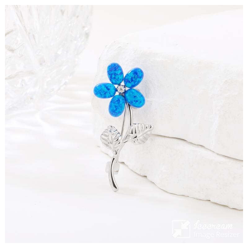 BROSZKA DAMSKA KWIAT Z NIEBIESKIM OPALEM 925